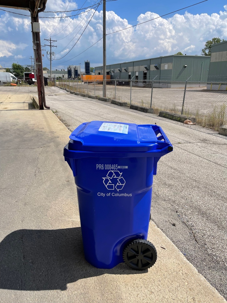 64 Gallon blue bin with wheels and hinged lid