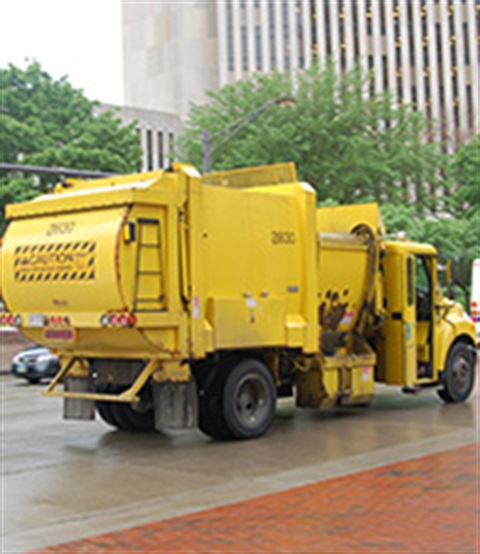 Yellow Garbage Truck